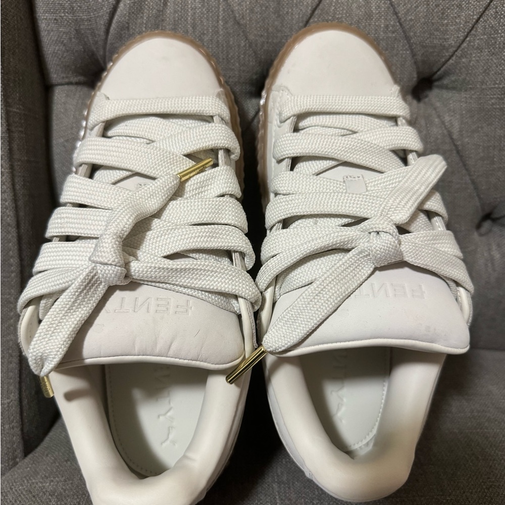 Puma Women's Off White Sneakers with Gold Accents